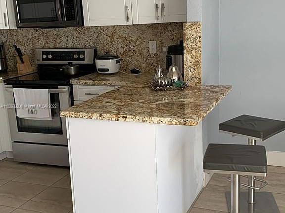 3rd image of 7085 W 17th Ct #7085