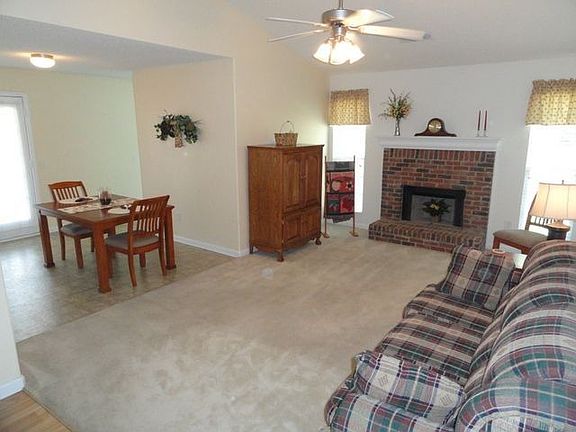 Living Room w/brick wood fireplace