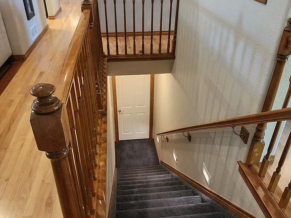 Stairway to full basement with nine foot ceilings