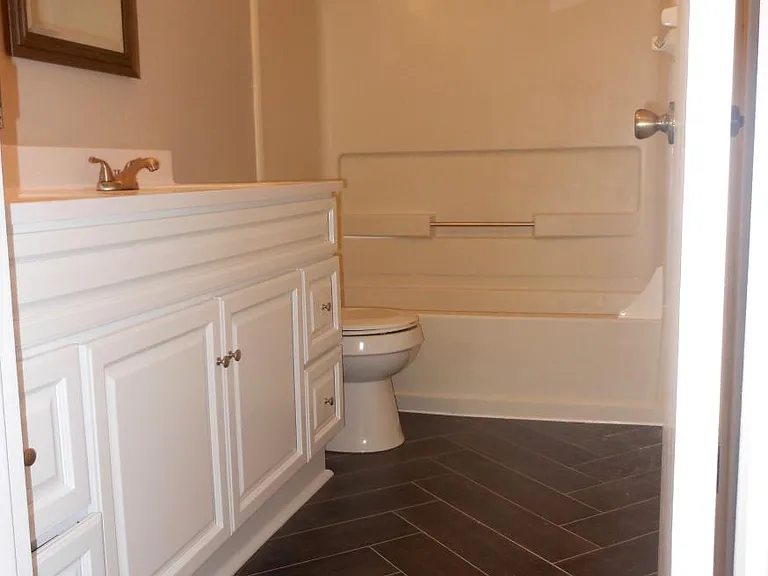 Clean, bright, and brand new full bathroom has double sink vanity. You can access this bathroom directly from the master bedroom or the shared hallway.