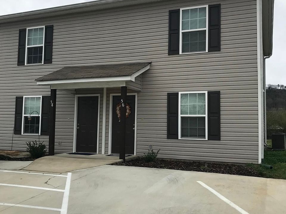 front of unit with 2 designated parking spaces