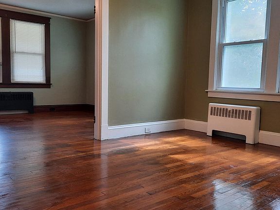 from kitchen into dining room and living room