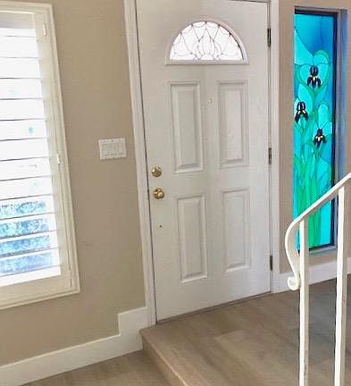 Entry with custom stain glass window