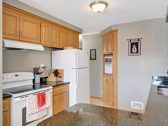 Kitchen has granite counters, dishwasher, and tons of cabinet space.