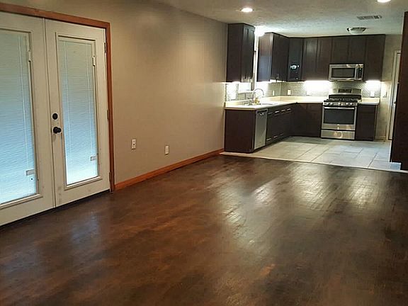 Den looking into Kitchen