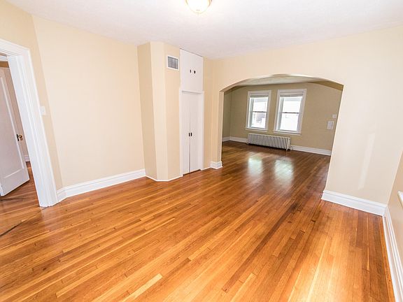 View of dining room looking into living room. Dining room has extra storage closet.