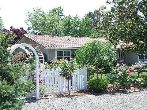 FRONT VIEW FROM SIDE ENTRANCE TO BACKYARD