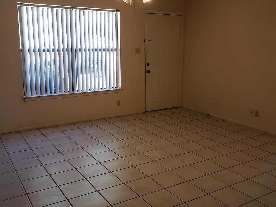 Spacious living area with big front window