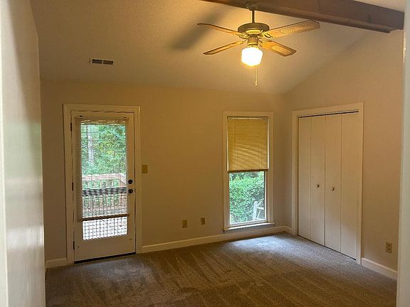 Master bedroom- two walk in closets- fresh paint and new carpet. Private entrance to the deck.
