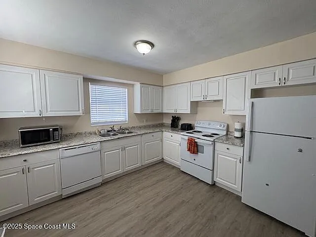 412 Clarence Rowe Ave — Photo 3