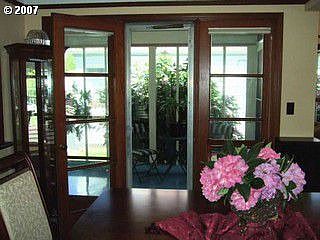 French doors to sunporch from dining room