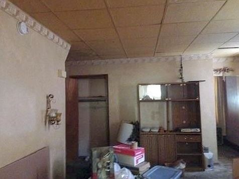 used as a living room but would be the formal dining room
