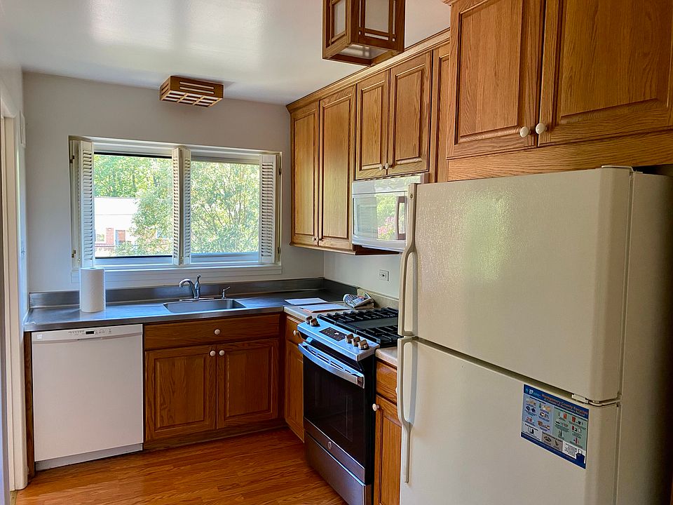Kitchen with updated cabinets and new gas stove/oven
