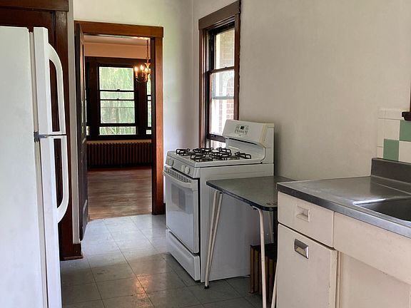 Equipped kitchen - pantry and cabinet storage.