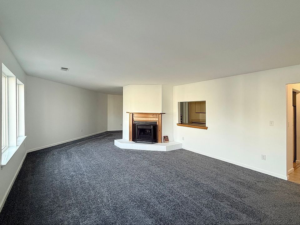 Living room with working fireplace