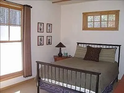Carpeted main floor bedroom