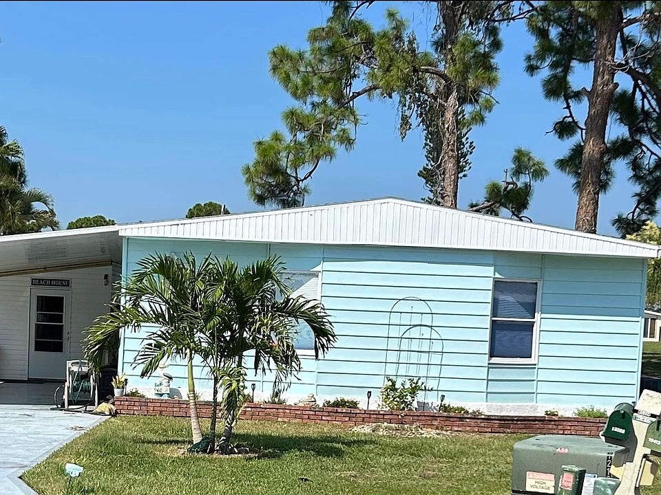 Large attached carport and spacious shed.
