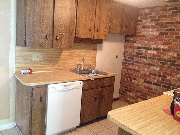 left side (fridge will be supplied)