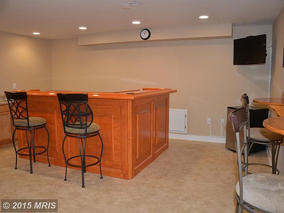 recessed lighting bar with mounted TV