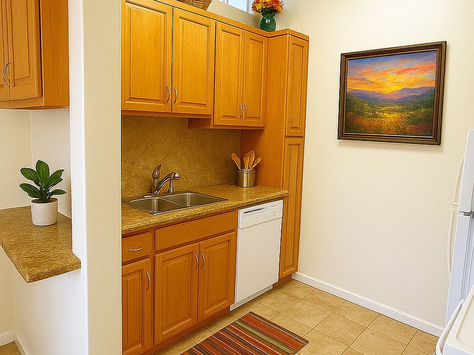 Most of our kitchens are remodeled with granite or quartz countertops, warm wood cabinetry, and travertine tile flooring.