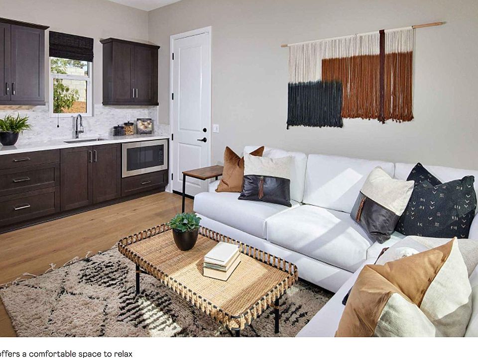 The separate apartment includes a private entrance, living area, kitchenette, bedroom and bathroom.