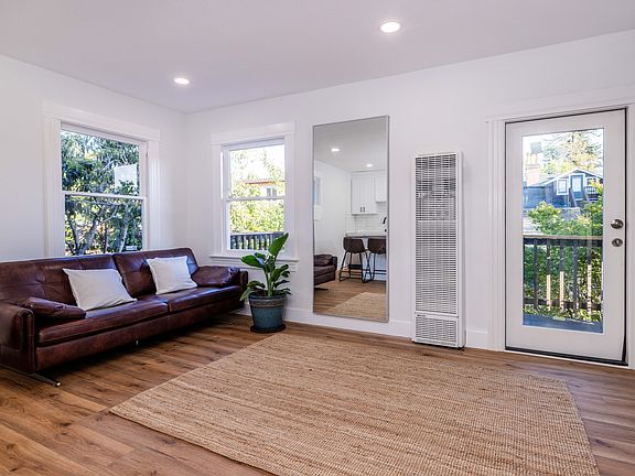 Open floor plan & tons of natural lights for shared co-living space.