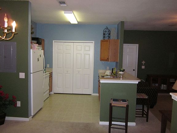 Kitchen with laundry room and pantry