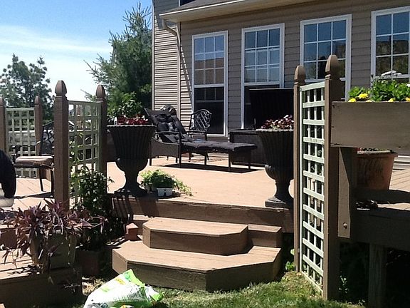 Entrance from yard to deck
						:
						One level of 3 level Deck taken from Yard onto Deck