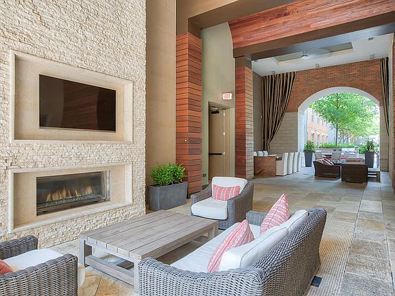 Enjoy our outdoor Loggia with plush seating and TVs
