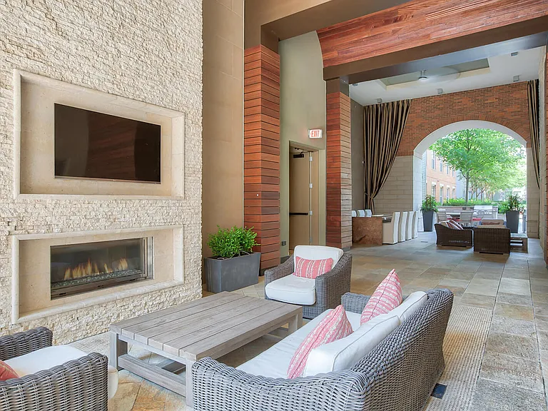 Enjoy our outdoor Loggia with plush seating and TVs