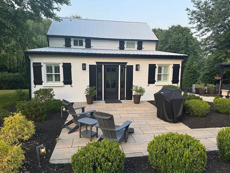 Front with Patio, Chairs and Grill