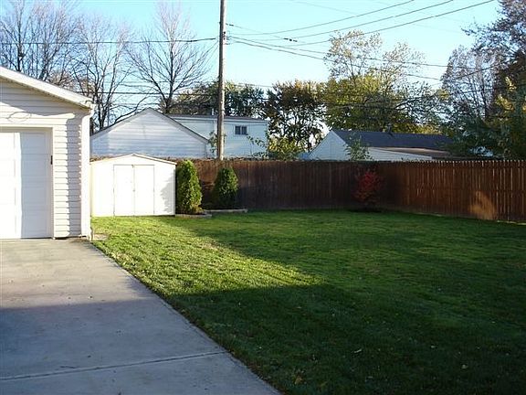 Fully Fenced Yard and Oversized Two Car Heated Garage