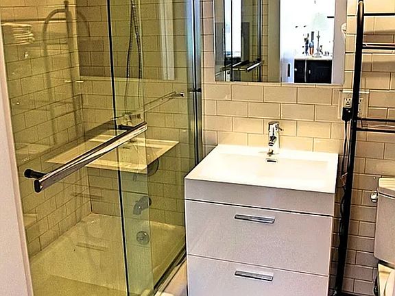 3rd image of 55 E 9th St APT 6J