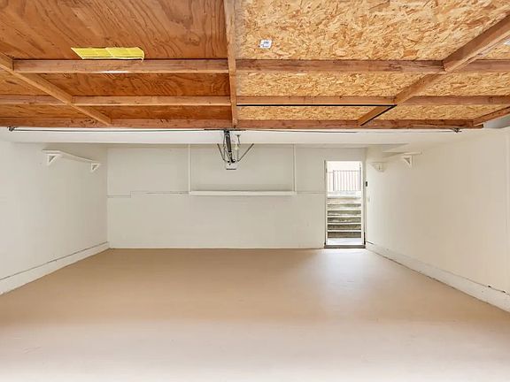 Large 2 car garage. with extra room for storage, work bench, surf boards, bikes. whatever you need