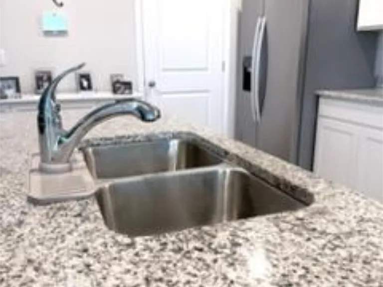 Island kitchen with granite countertops