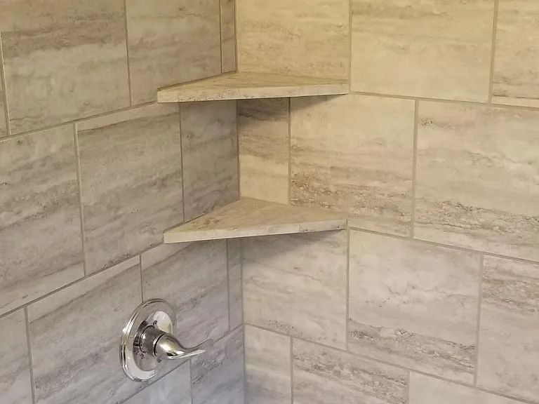 Tile surround in hall bath