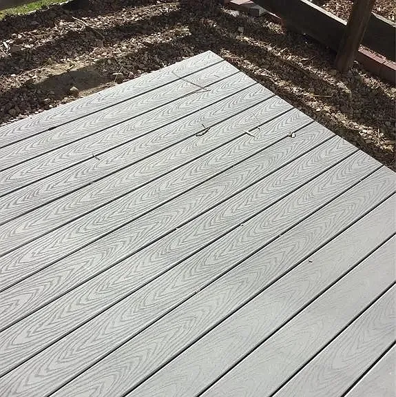 Trex composite deck in backyard area.