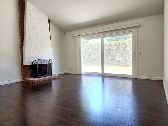 Large Living Room with Vaulted Ceiling and Fireplace