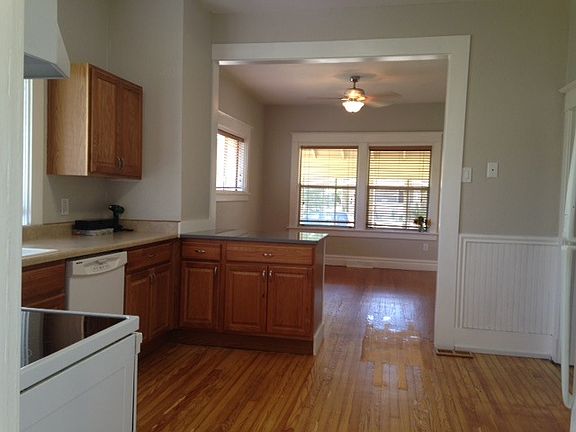 View from back room through kitchen to living room