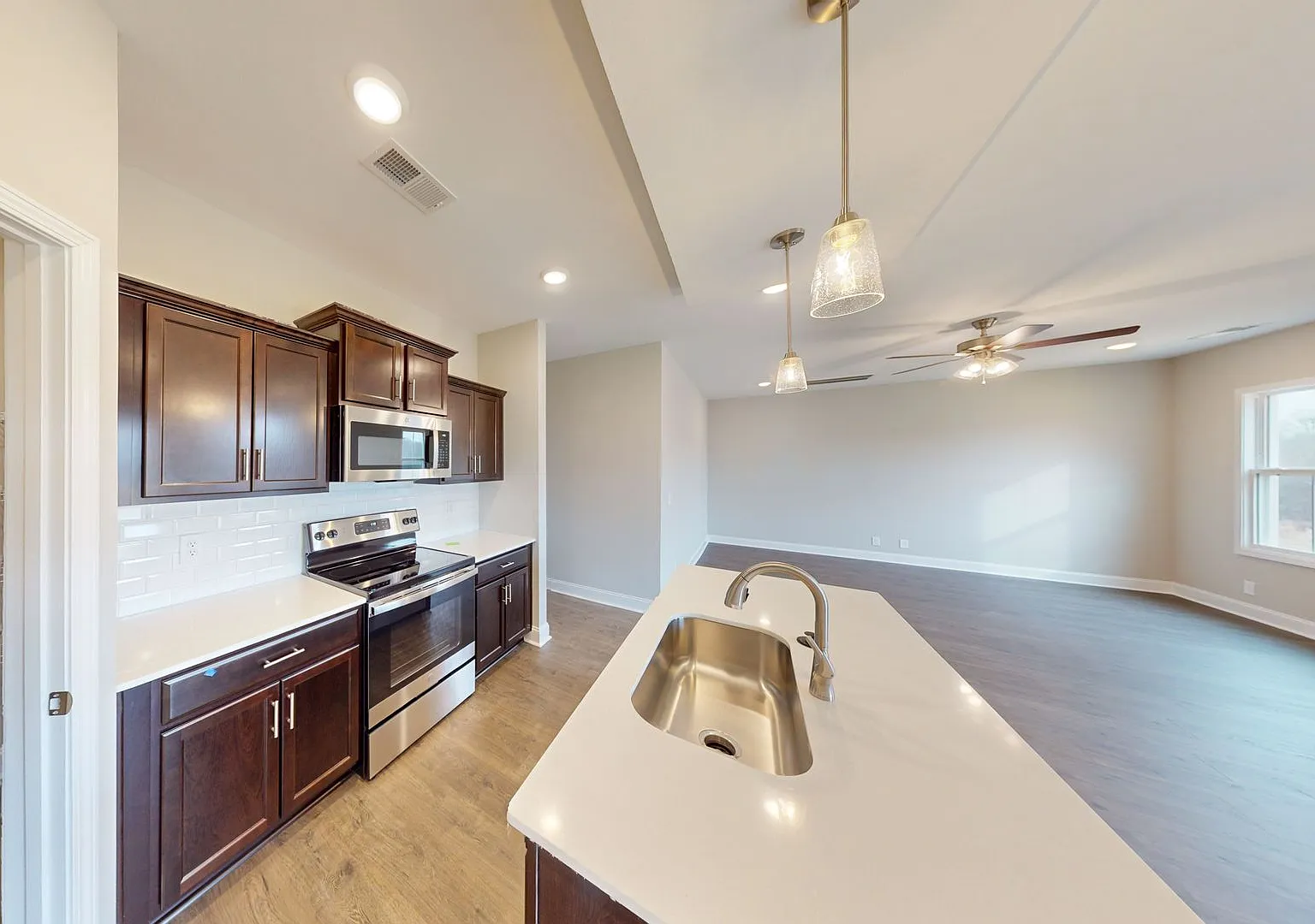 Front Porch Charmer With Hardwood Flooring, Kitchen Island, Pantry and Back Covered Back Deck — Photo 4