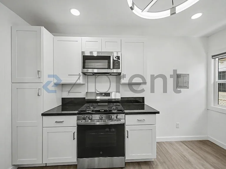 10907 S Burl Ave — Photo 8