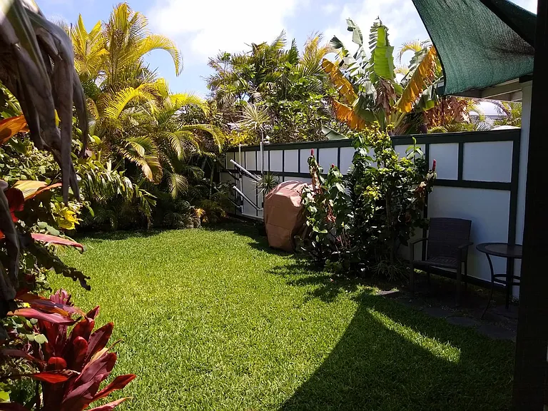 Surfboard Racks to store your boards. BBQ, Seating area, Sunshade for backyard enjoyment