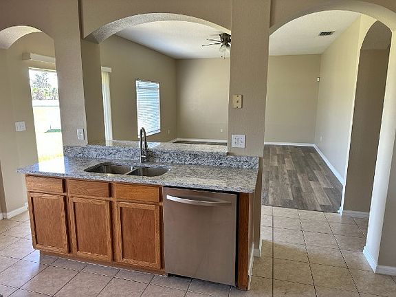 Kitchen looking into living room