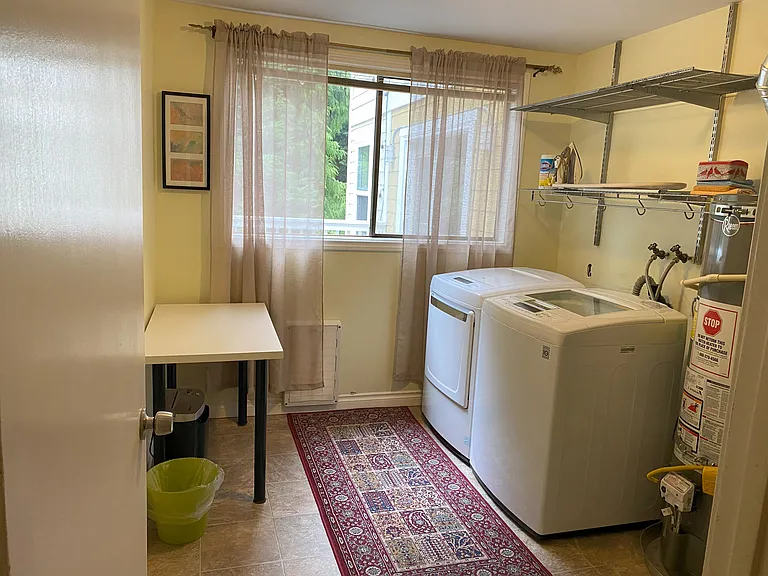 Laundry room with full size washer and dryer and Mail room