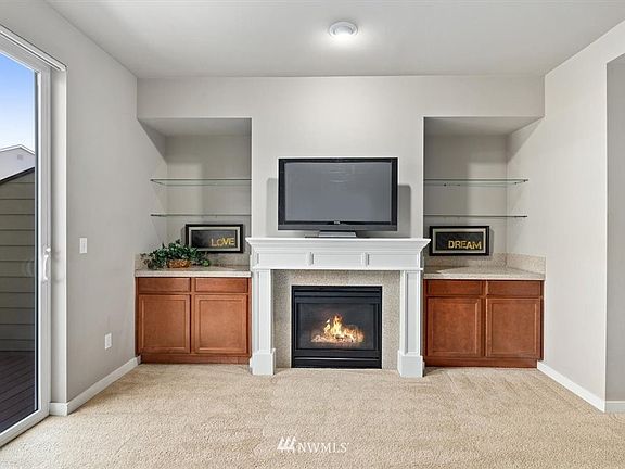 **Photo is of Unit I-104 - Colors and materials may vary slightly**