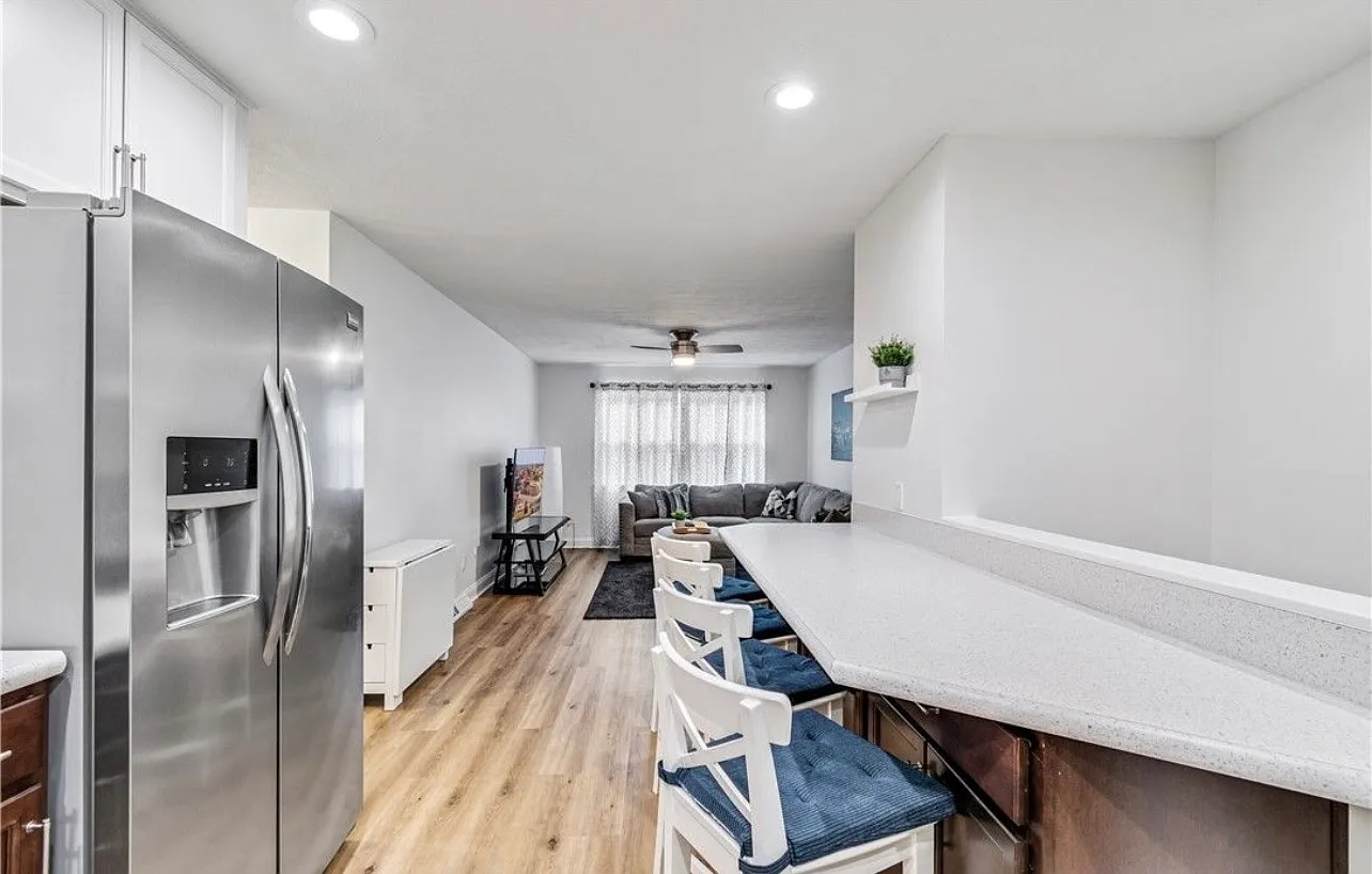 Updated 2BR Duplex with Garage, Rec Room & Balcony — Photo 3