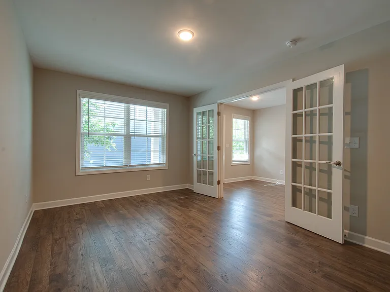 Flex room on ground floor that can be used as a den, a home office, playroom or gym.