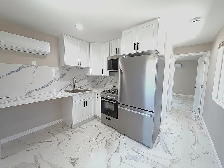 7443 Penfield Ave — Photo 6