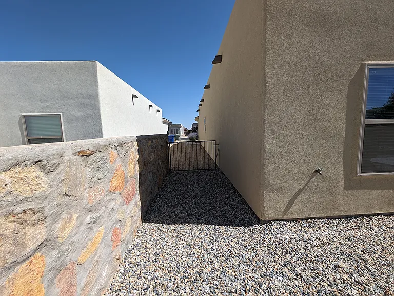 View of the other side yard with low gate.