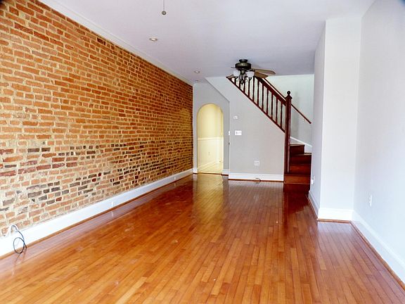 Open Living & Dining Area w/ Exposed Brick!
